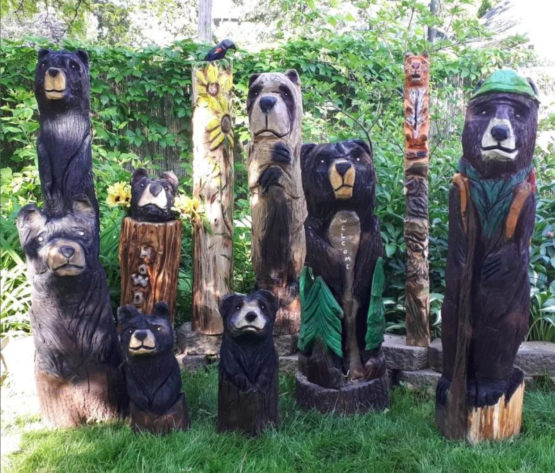 bunch of bear carvings on lawn